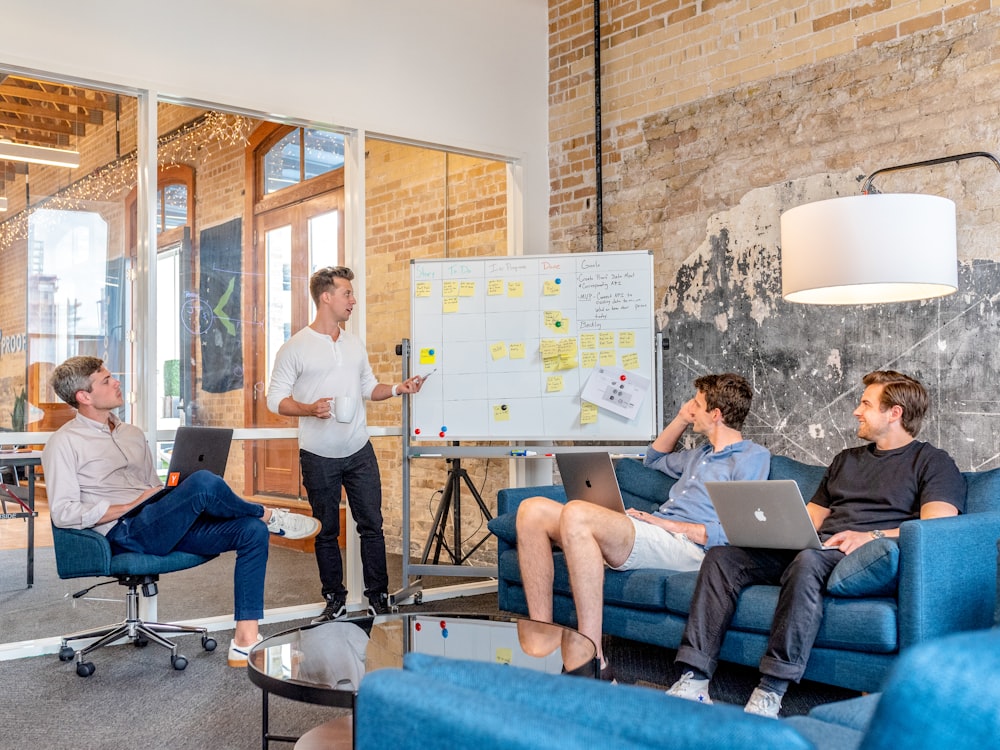 people sitting around office brainstorming