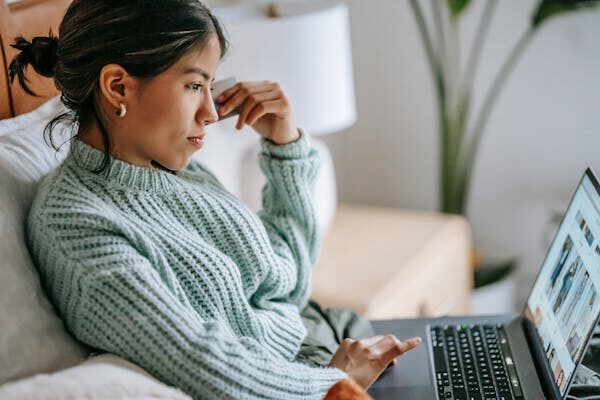 Woman working at home on laptop