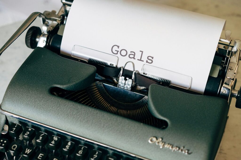 typewriter with "goals" typed out